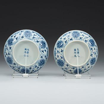 A pair of blue and white lotus dishes, Qing dynasty, Guangxu mark and of period (1874-1908).