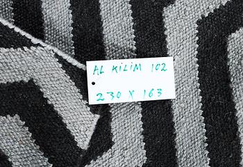 A Kilim rug with modern design, c. 230 x 163 cm.