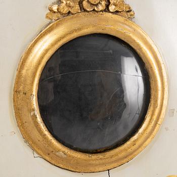 A long-case clock, 19th century.