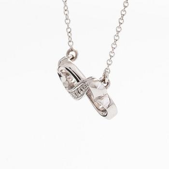 Tiffany & Co, Paloma Picasso, "Double Loving Heart" kaulakoru, 18K valkokultaa ja briljanttihiottuja timantteja.
