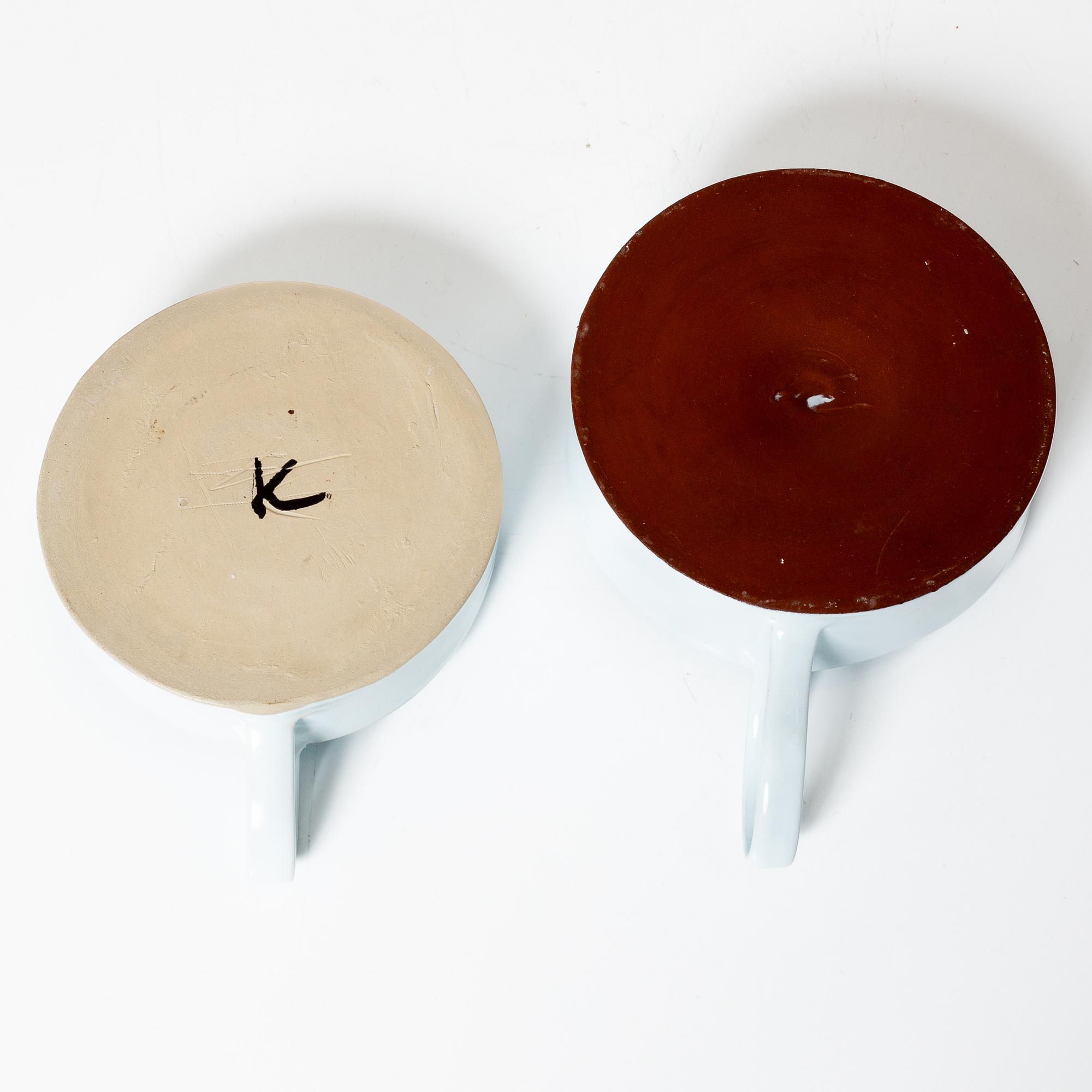 Kennet Williamsson, a set of eight ceramic pieces, signed.