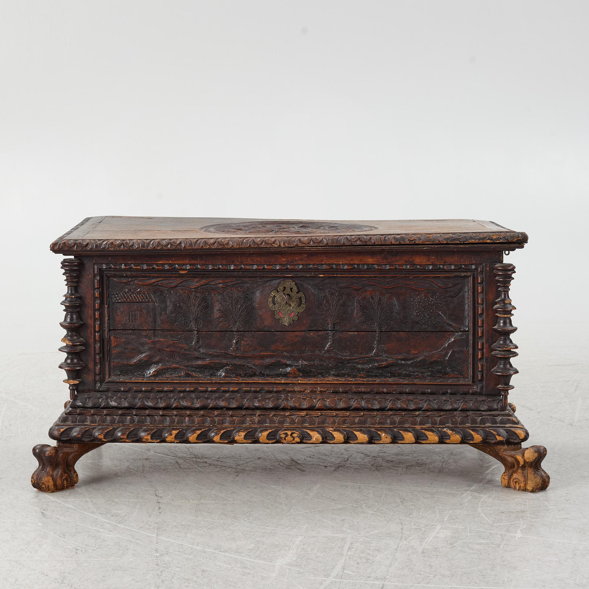 A baroque style wooden chest, 19th century.