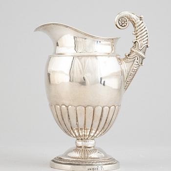 A Swedish empire parcel gilt silver creamer, mark of Anders Lundqvist, Stockholm 1828.