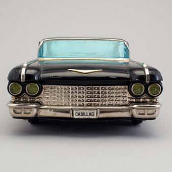 A tinplate Cadillac by Yonezwa, Japan. Ca 1960.