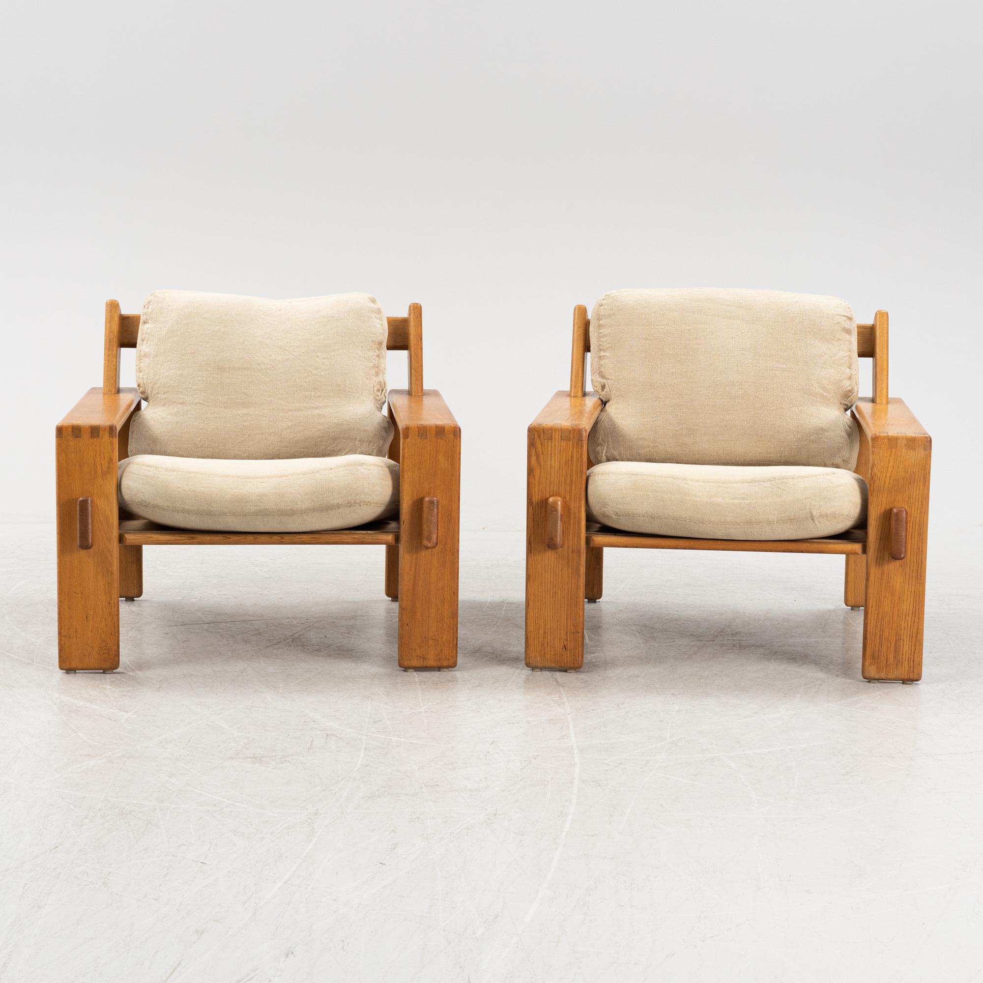 Esko Pajamies, a pair of oak 'Bonanza' lounge chairs from Asko, 1970's.