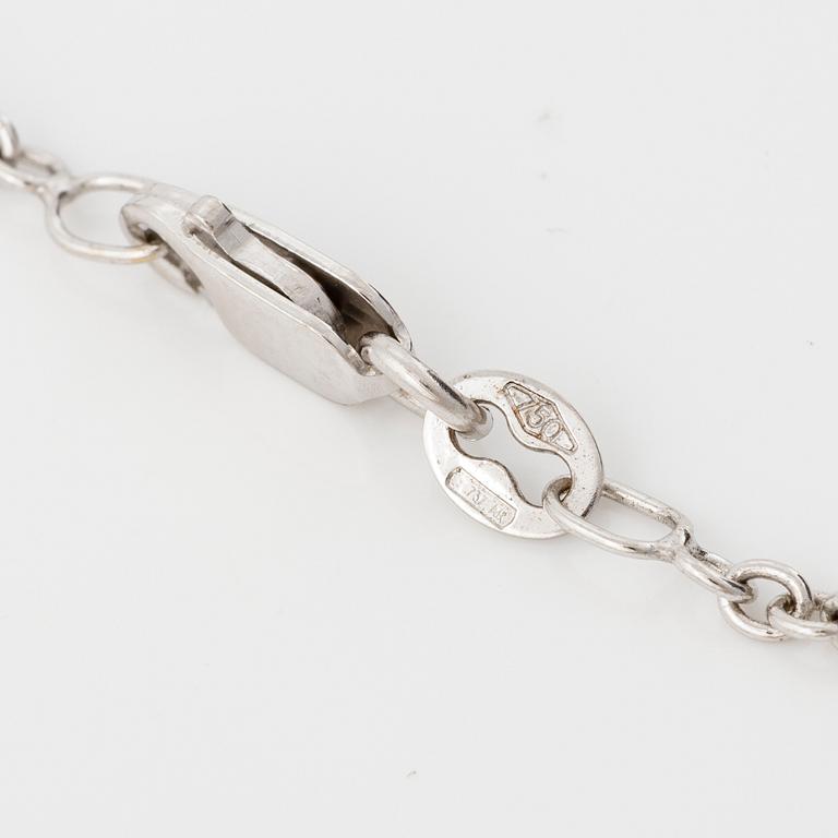 Necklace 18K white gold with pear-shaped and emerald-cut diamond accompanied by IGI and GIA report.