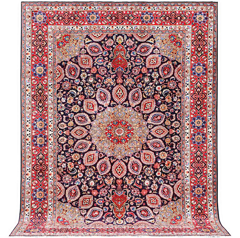 A Meshed carpet, c. 352 x 253 cm.