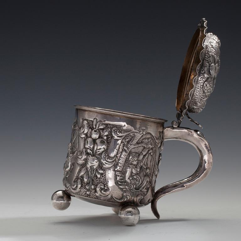 A TANKARD silver. Germany 1800 s. Height 13 cm. Weight 414 g.