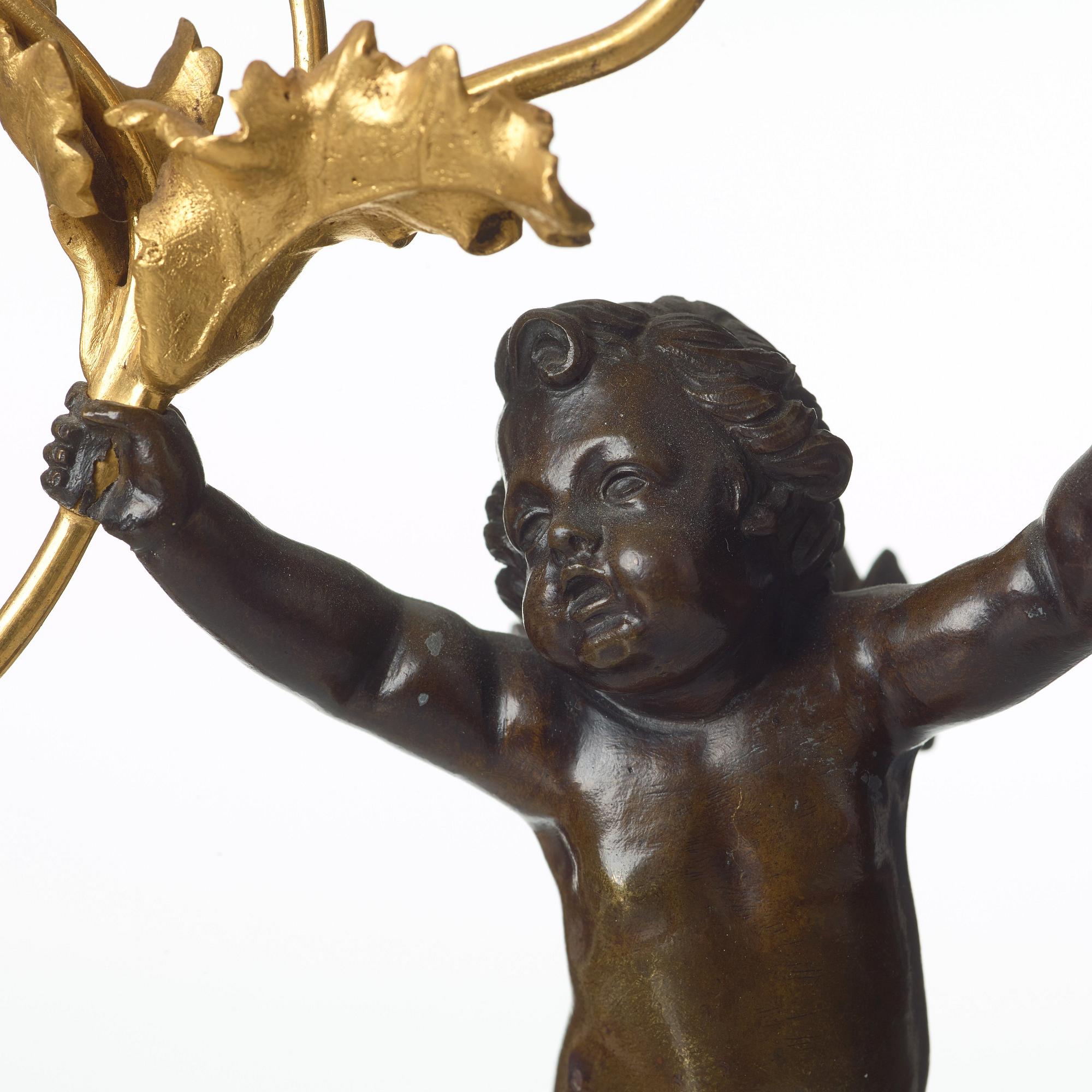 A pair of Louis XVI late 18th century two-light candelabra.