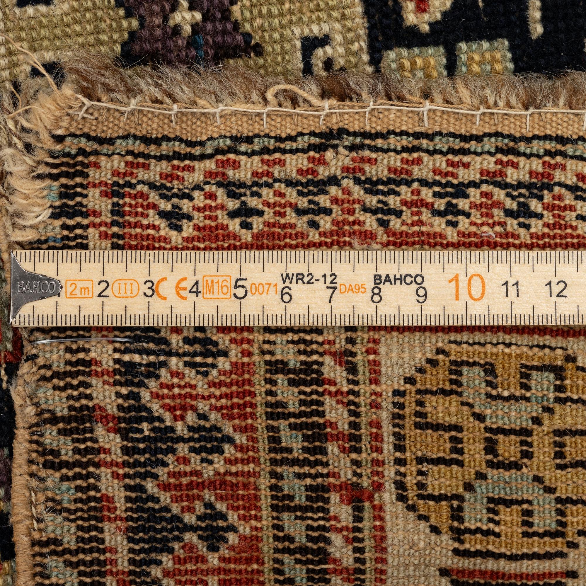 An antique Chi Chi rug, Northeast Caucasus, c. 180 x 120 cm.
