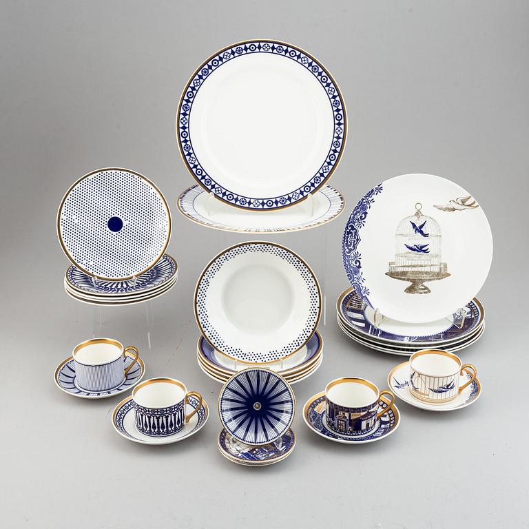 A 24 pcs bone china service from Flux Stoke on Trent, different motives and designers, designed in 2012. England.