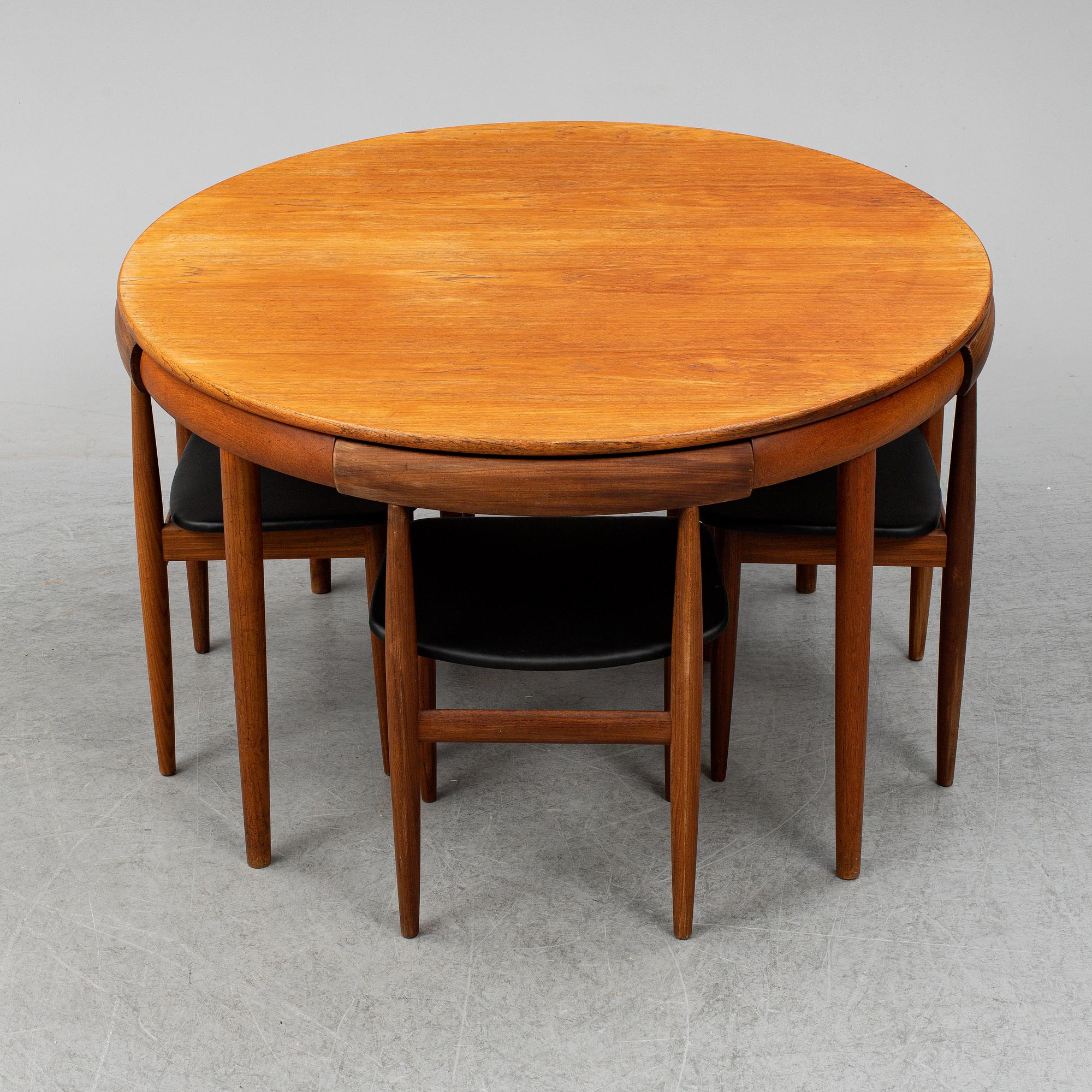 HANS OLSEN, a five-piece teak fining suite from Frem Røjle, Denmark, 1950's/60's.
