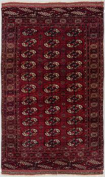 A RUG, semi-antique/old Tekke, ca 199 x 122,5 (as well as 5 flat weave at both of the ends).