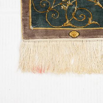 A silk rug, oriental, ca 163 x 166 cm.