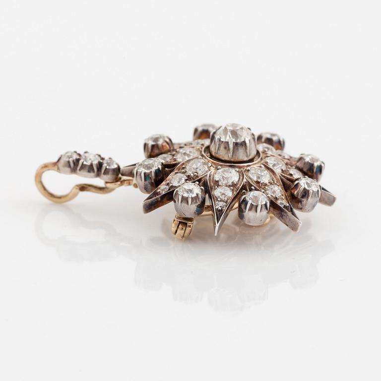 A 19th century gold and silver brooch/pendant set with old-cut diamonds.