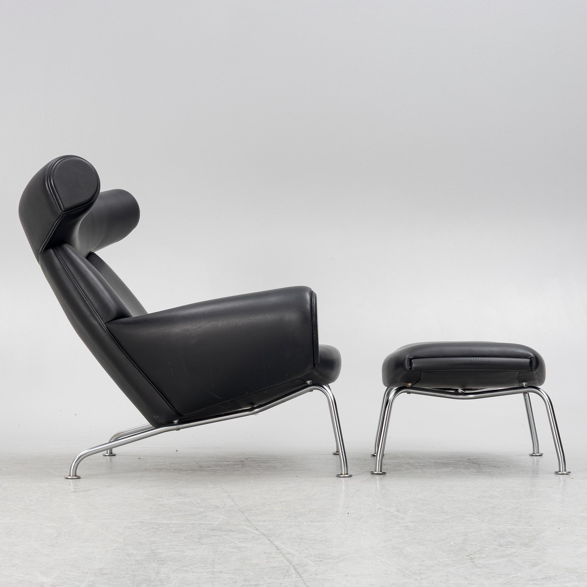 Hans J. Wegner, fåtölj med fotpall, "Ox Chair", EJ-100, Erik Jørgensen Møbelfabrik A/S, Svendborg, Danmark.