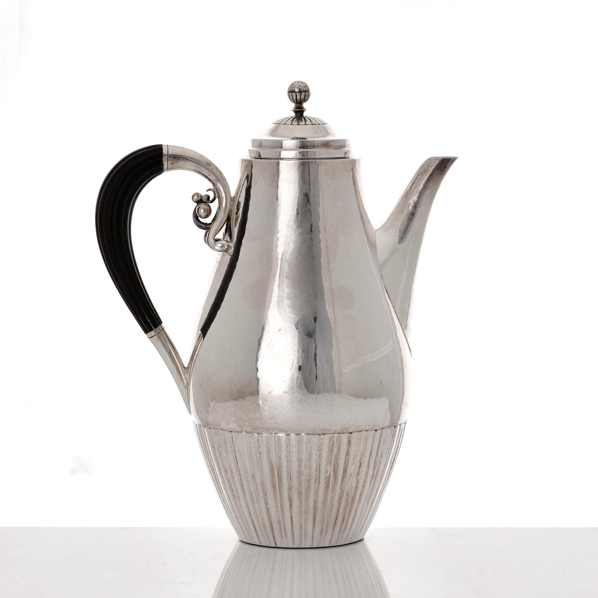 Johan Rohde, a three pieces sterling silver coffee service "Cosmos", Georg Jensen, Copenhagen 1945-77, design nr 45 A + D.