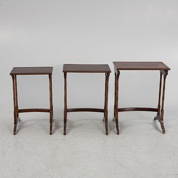 Three-piece nest of tables, mid-20th century.