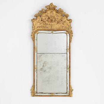 A rococo mirror, second part of the 18th Century.