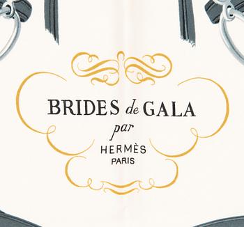 Hermès, a 'Brides de Gala' silk scarf.