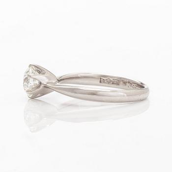 A platinum ring, with a brilliant-cut diamond approximately 1.00 ct according to the engraving.