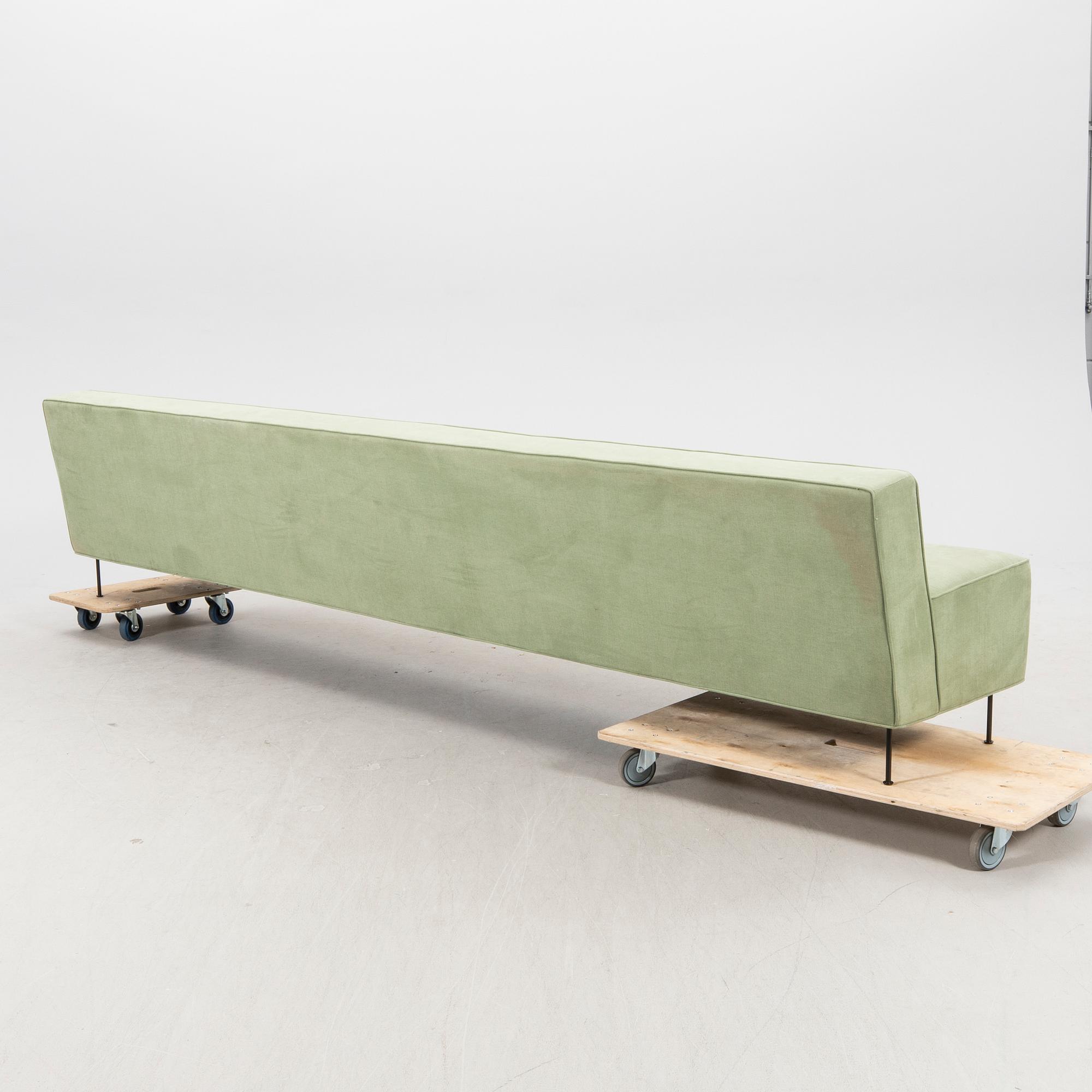 A sofa Modern Line' by Greta Magnusson Grossman, produced by Gubi, contemporary.