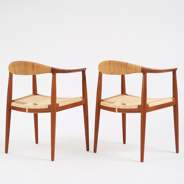 Hans J. Wegner, a pair of teak and rattan 'The Chair', JH-503, Johannes Hansen, Denmark 1950s.