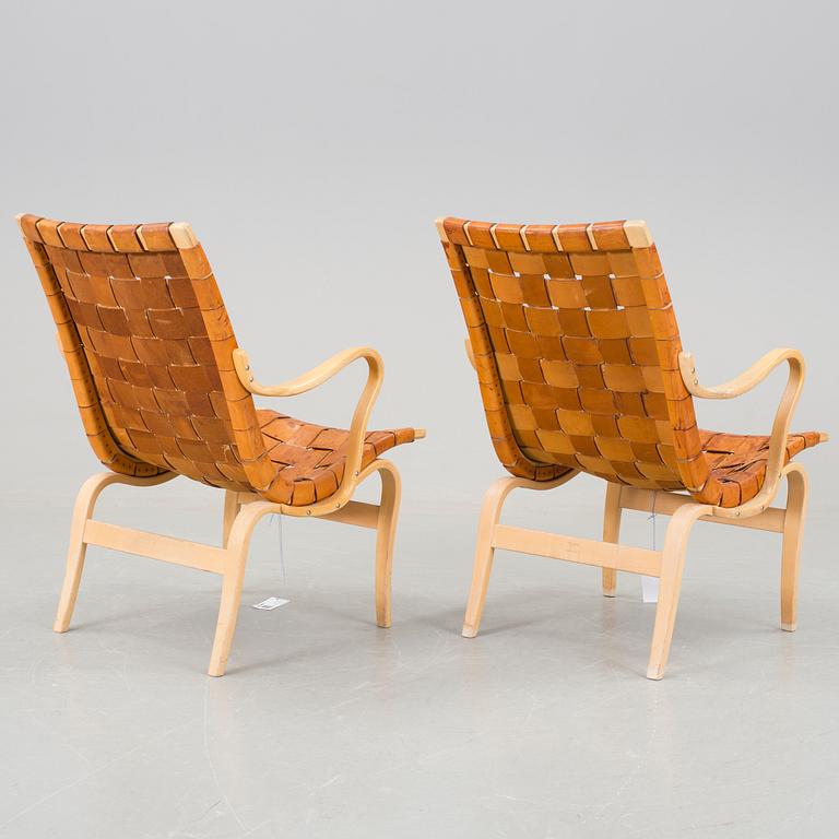 A pair of Bruno Mathsson "Eva" armchairs.