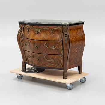A rococo style parquetry and gilt-bronze mounted commode, circa 1900.
