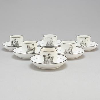 Six soft paste cups with saucers, early 19th century.