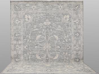 A carpet, Ziegler design, approx. 427 x 305 cm.