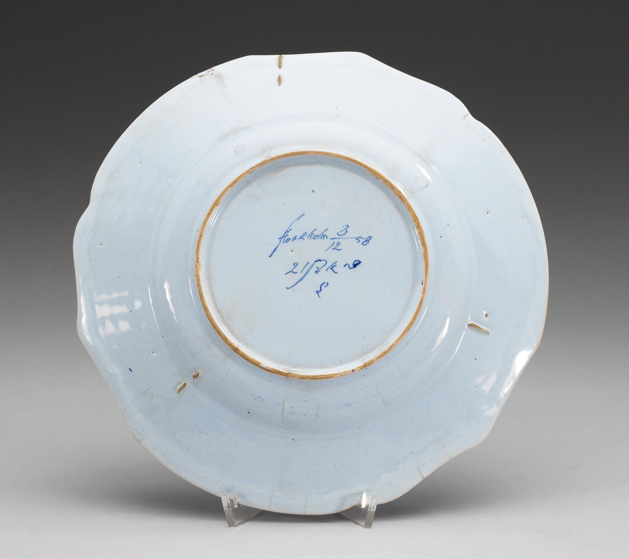 A set of three Swedish Rörstrand faience dishes, dated  21/11-1758, 2/10-58 and 3/12-58.