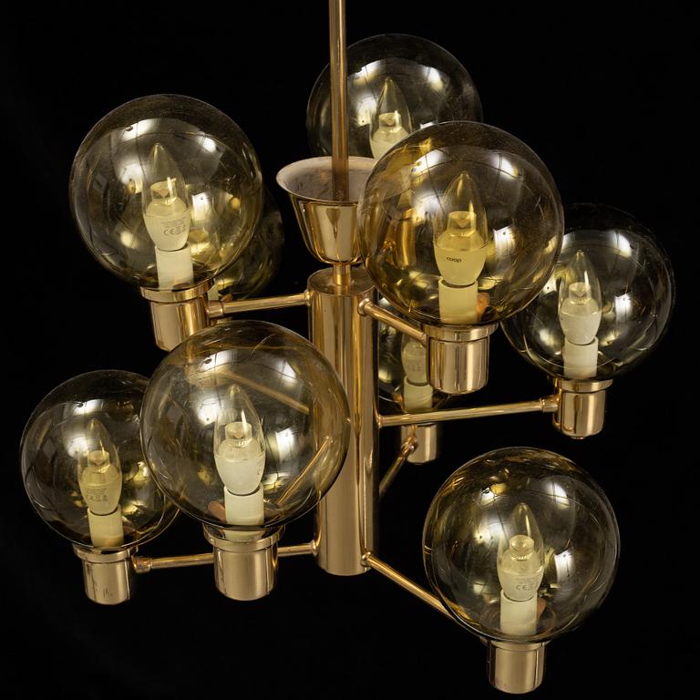 A 1960's brass and glass ceiling light.