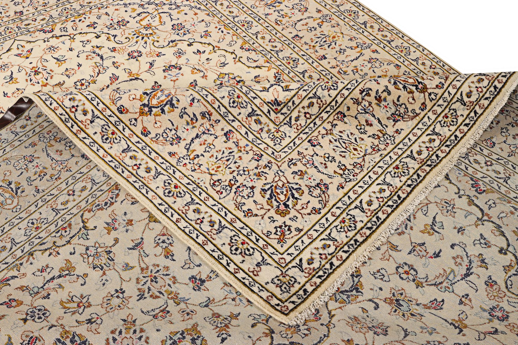 A Kashan carpet, c. 355 x 242 cm.