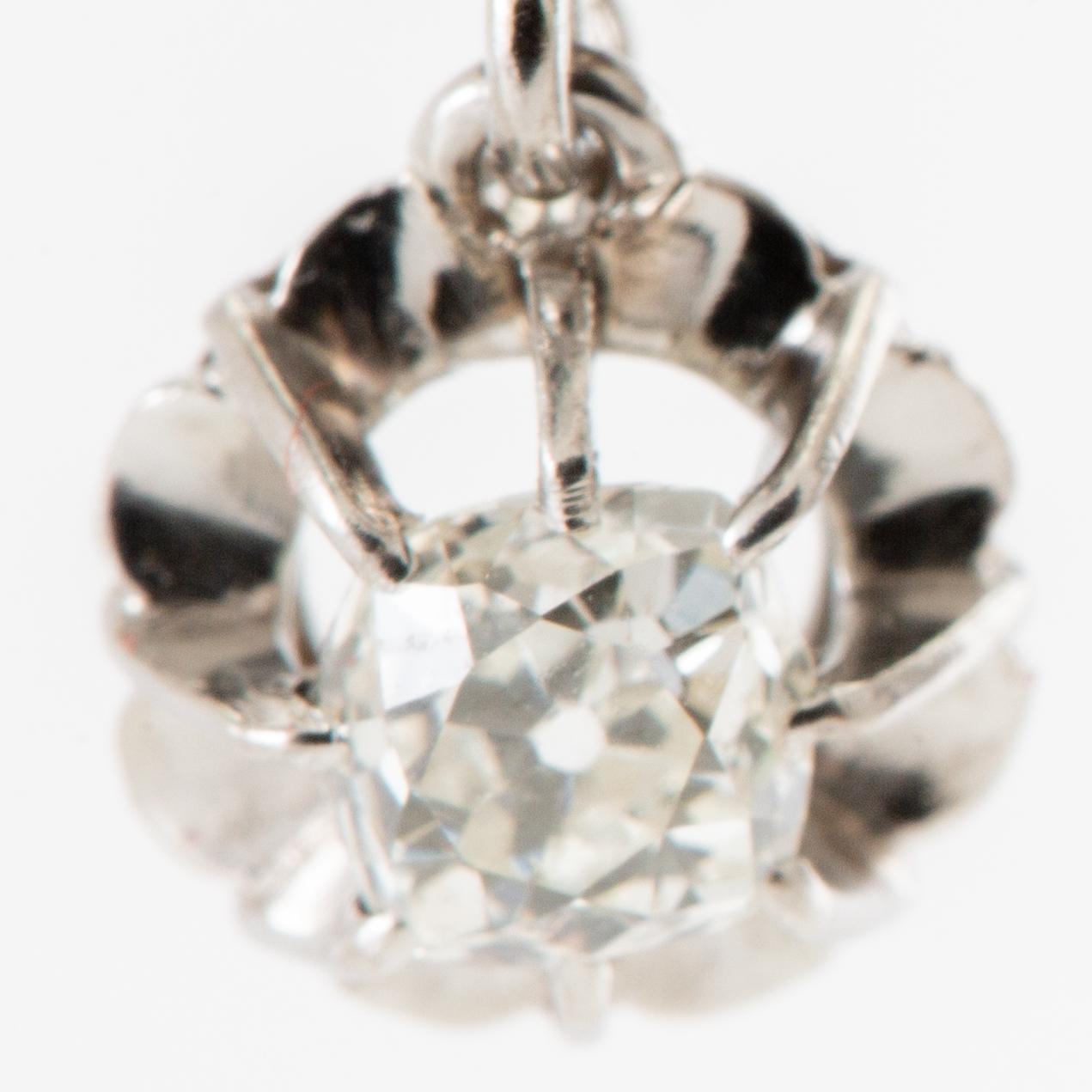 Earrings, a pair of 950 platinum set with old-cut diamonds.