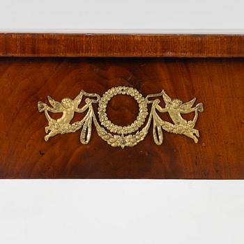 An empire console table, firts half of the 19th century.