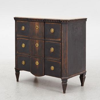 A chest of drawers, circa 1900.