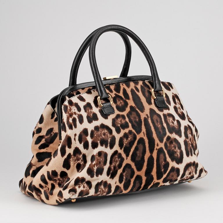 DOLCE & GABBANA, a leopard patterned handbag.