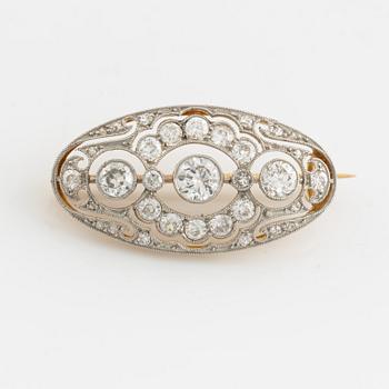 Gold and platinum and old cut diamond brooch.
