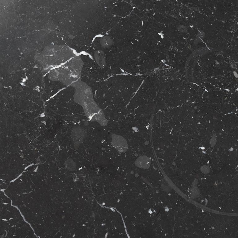 Louise Roe, a 'Roundabout' dining table with marble top.