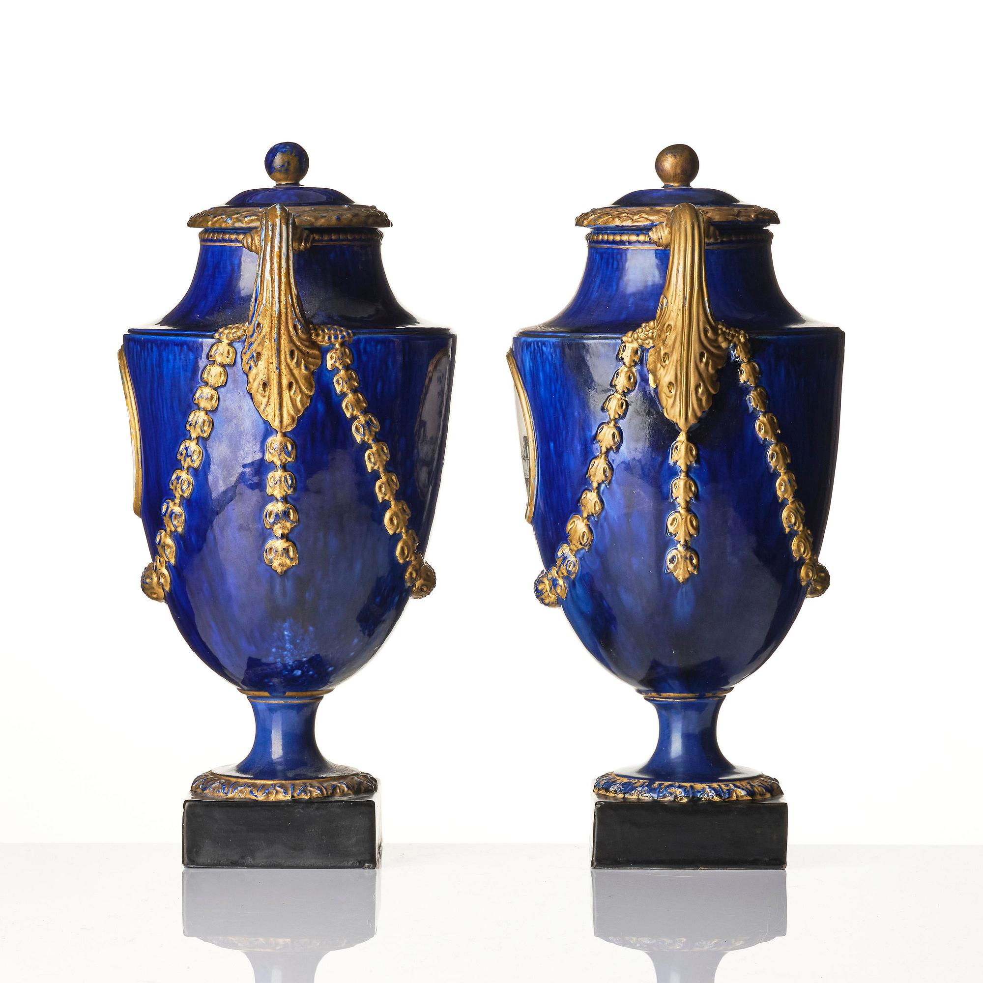 A pair of Swedish cream ware 'pistol handle' jars with covers, 1790's.