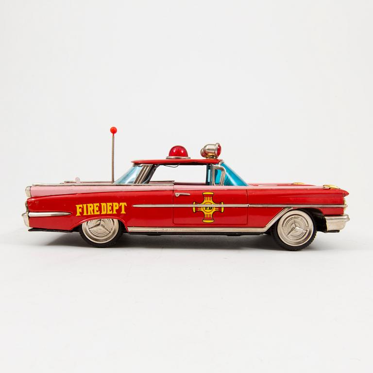 A tinplate Ichiko "Fire Dept Chief's car" Oldsmobile, Japan, 1960s.