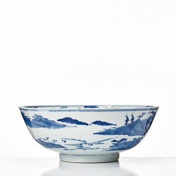 A blue and white bowl, Qing dynasty, 19th Century with Kangxi mark.