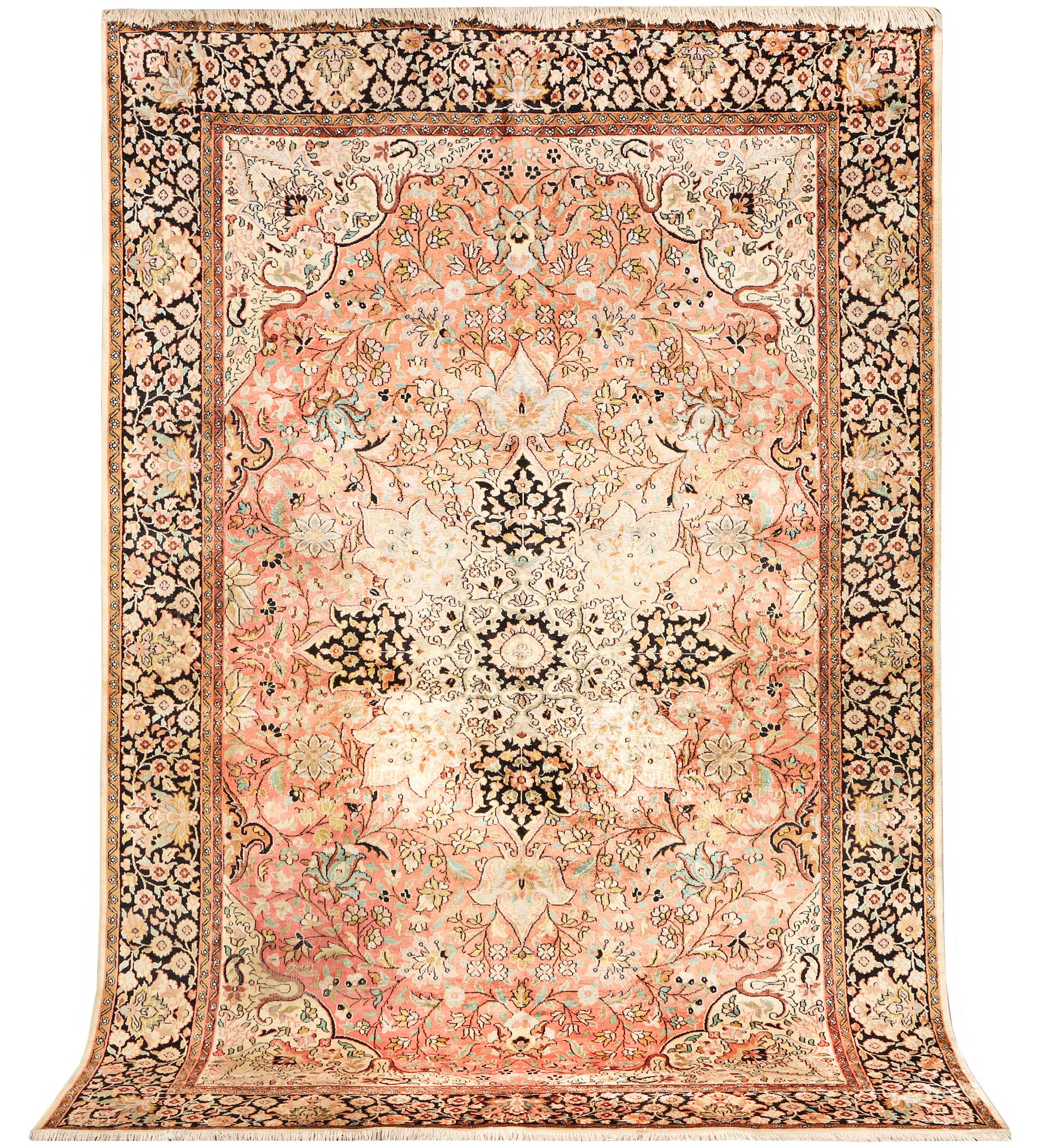 A silk Kashmar carpet, c. 280 x 177 cm.