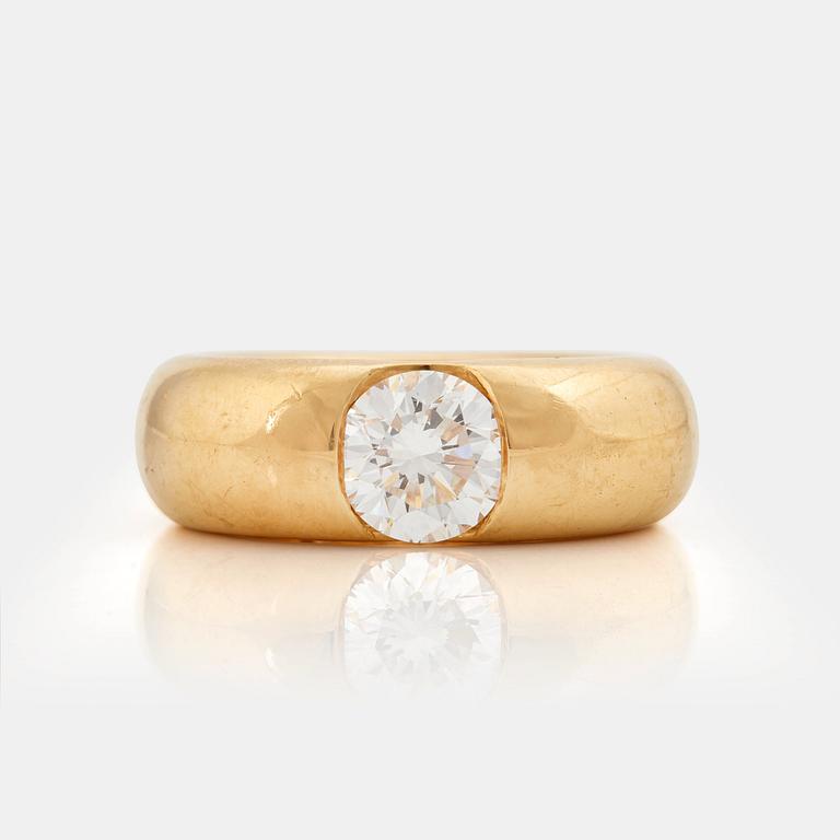 A oval brilliant cut diamond ring by Cartier.