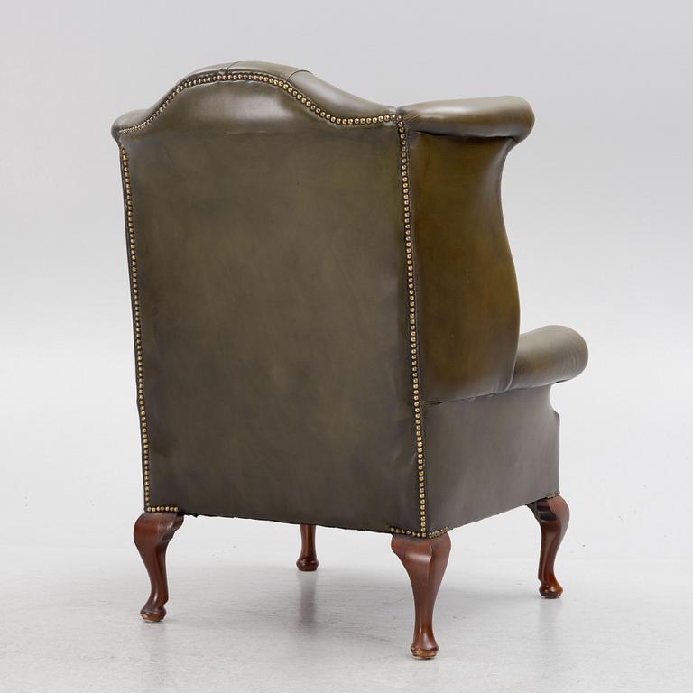 A wingback armchair, 20th century.