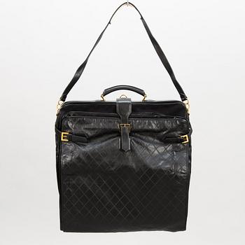 CHANEL, Black Quilted Garment Cover Bag.