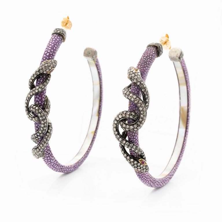 A pair of earrings in the shape of a snake, leather, mother-of-pearl and silver, with  diamonds in various cuts.