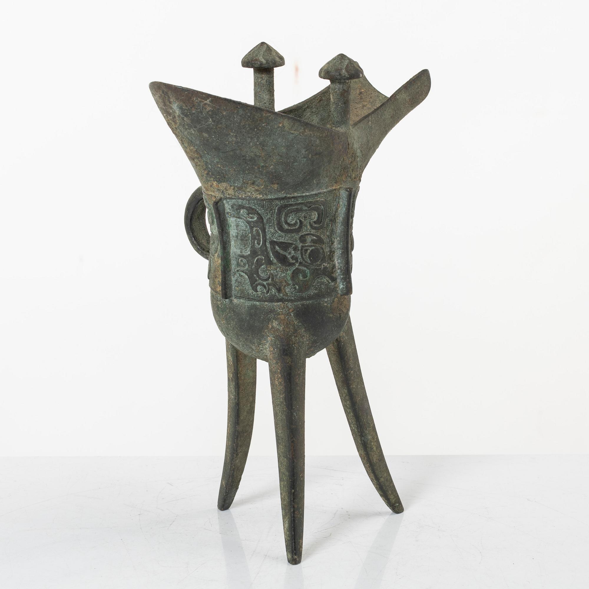 An archaisitic bronze Jue vessel, Qing dynasty.