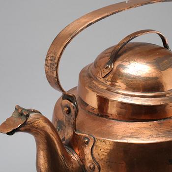 A coffee pot and a ladle in copper from the 19th century.